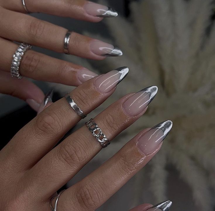 Chic Nude and Silver Tip Almond Nails: A Timeless Glamour Statement.