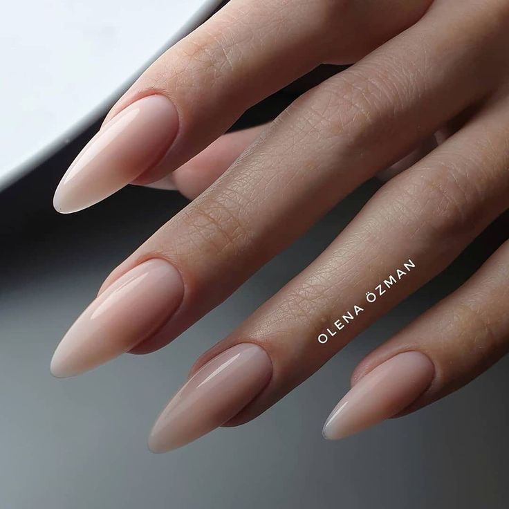 Sleek Almond-Shaped Nails with Nude Gradient for Versatile Elegance