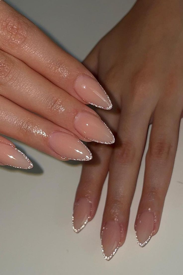 Sophisticated Almond-Shaped Nails with Nude Base and Silver Outline