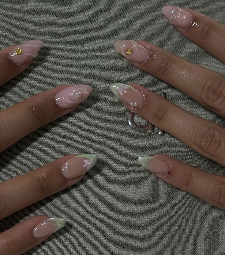 Sophisticated Almond-Shaped Nail Design with Soft Pink and Mint Green Floral Accents