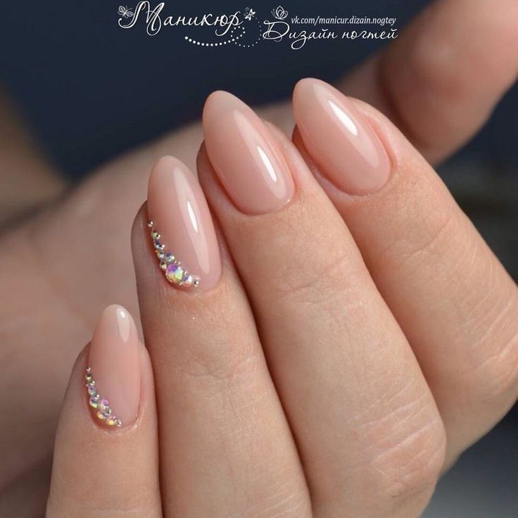 Elegant Almond-Shaped Nude Nails with Glossy Finish and Rhinestone Accent