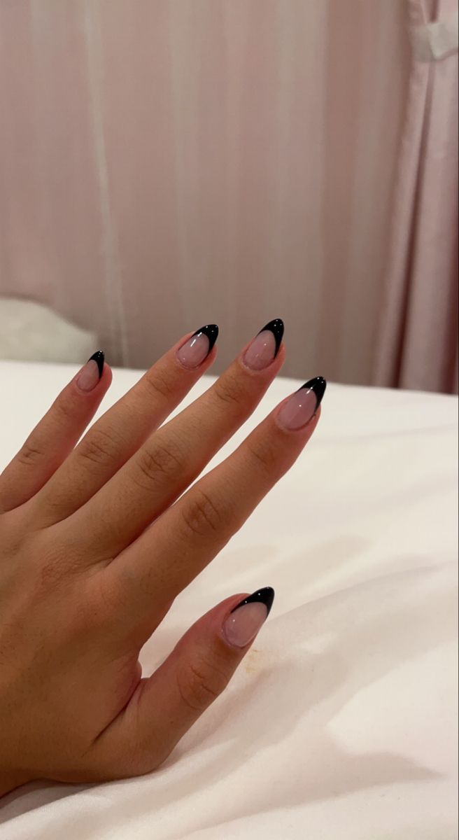 Chic Almond-Shaped Nails: Elegant Pink Base with Bold Black Tips