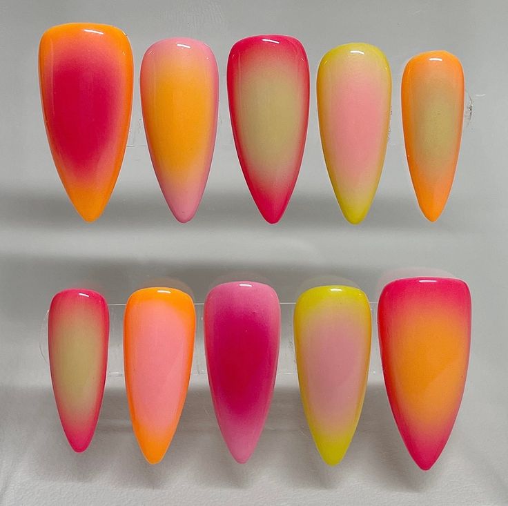 Vibrant Gradient Nail Designs: A Cheerful Twist on Summer Aesthetics.