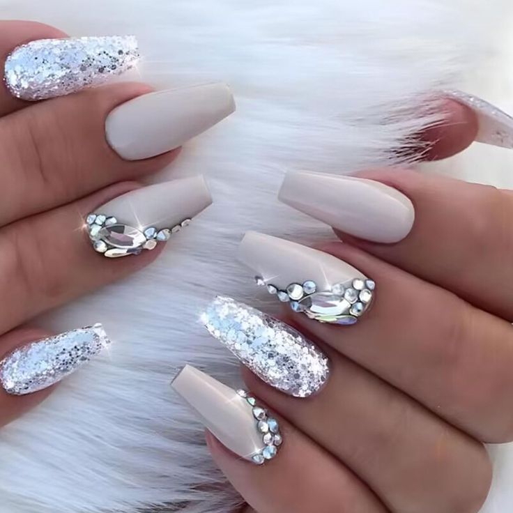 Chic Nail Design: Sleek Nude with Sparkling Glitter & Elegant Geometric Rhinestones