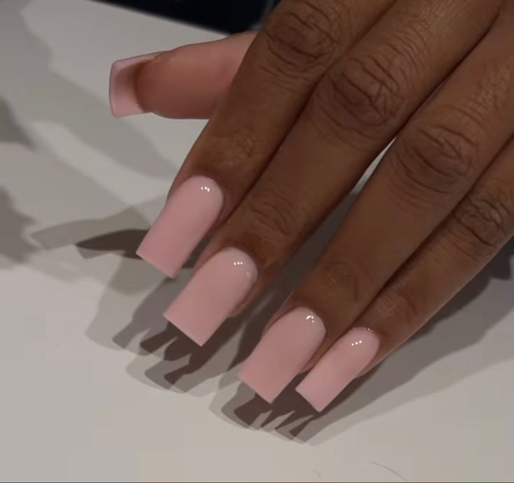 Sophisticated Elegant Pink Acrylic Nails in Sleek Rectangular Shape.