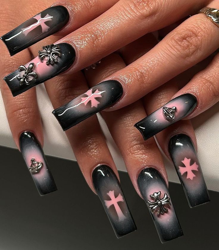 Gothic-Inspired Nail Design: Striking Black and Pink Ombre with Metallic Accents.