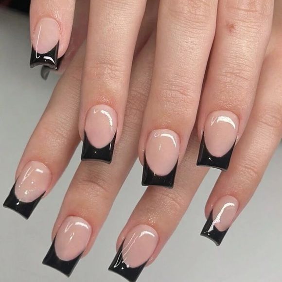 Modern French Tip Nail Design: A Bold Contrast of Glossy Black and Natural Pink for Elegance and Edginess.