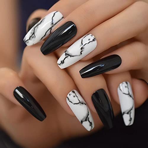 Chic Black and White Marble Nail Design for a Sophisticated Look.