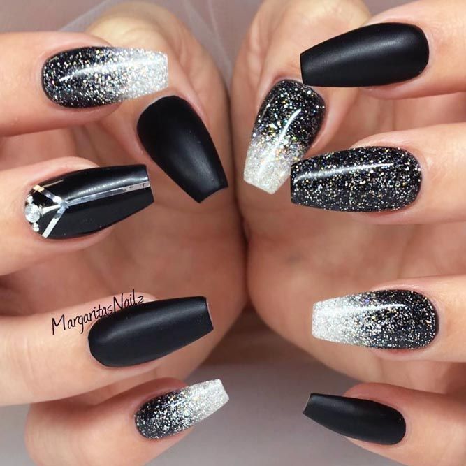 Chic Nail Design: Matte Black with Sparkling Silver and Jewel Accents