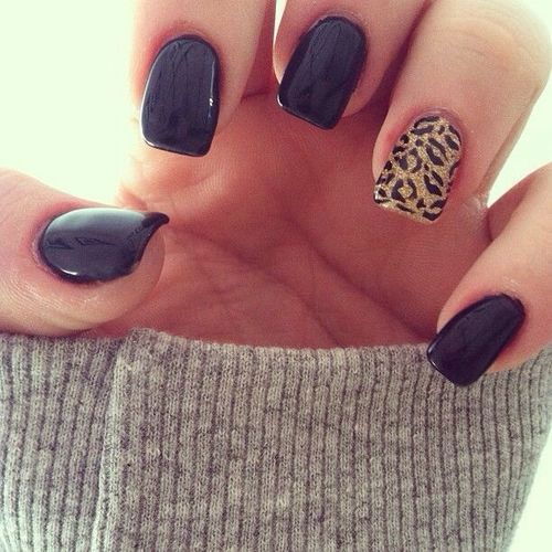 Elegant Black Manicure with Chic Leopard Accent Nail for Versatile Flair