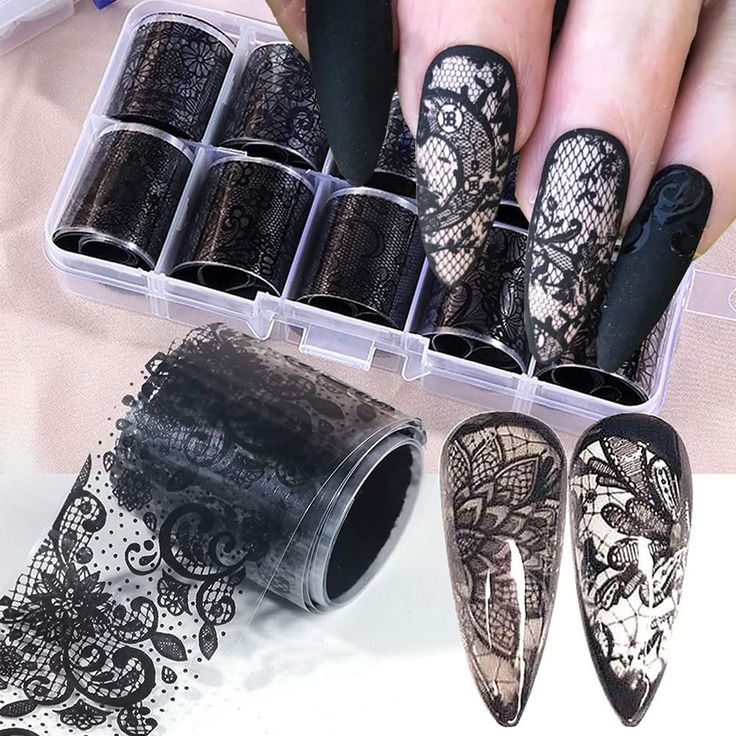 Sophisticated Black Lace Nail Designs with Intricate Patterns.