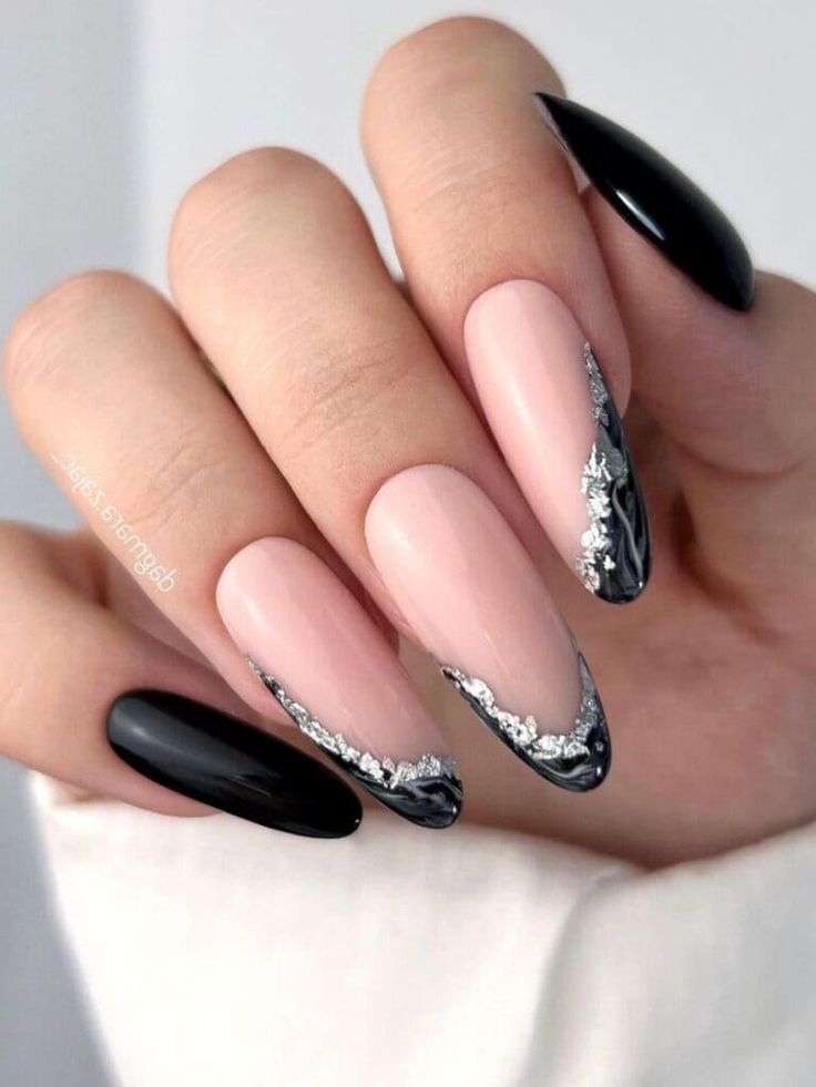 Chic Elegant Nail Design with Nude Pink and Glossy Black Accents.