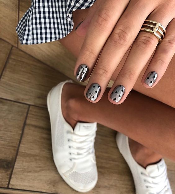 Chic Muted Gray Nail Design with Polka Dots and Linear Accents for Everyday Style.