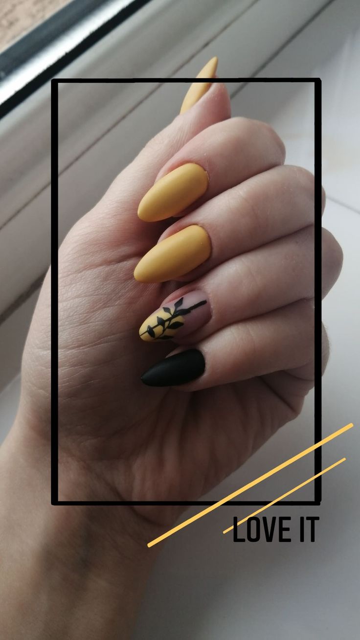 Bold Yellow Matte Nails with Elegant Black Floral Accent