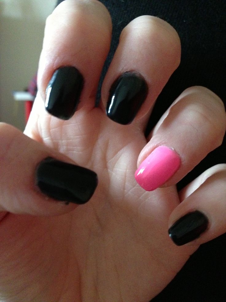 Bold Black and Pink Nail Design: Sleek with a Playful Accent.