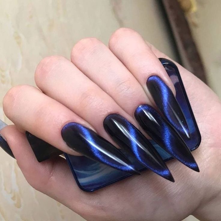 Bold Deep Blue and Black Long Nails with Glossy Metallic Finish and Sharp Tips.