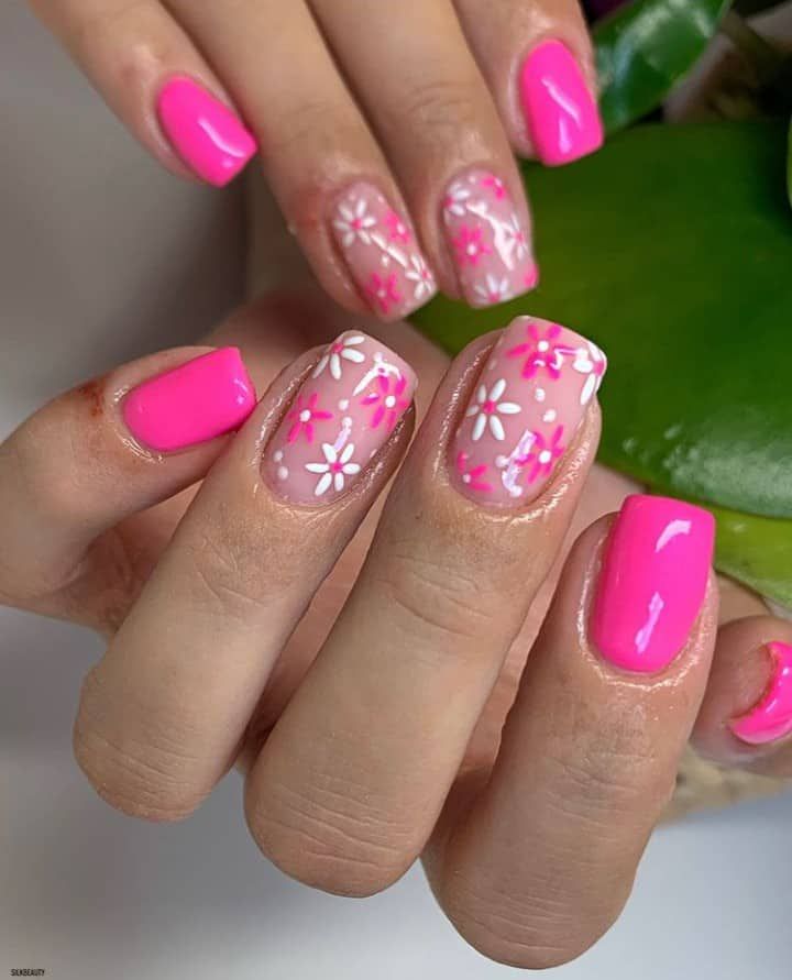 Bold Pink and Floral Nail Design for a Fun Sophisticated Look.