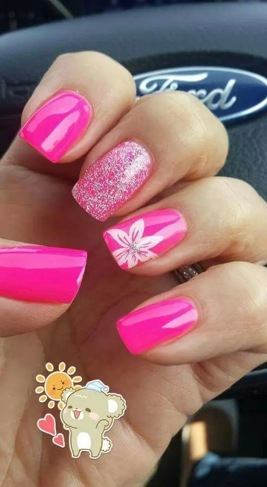 Chic Summer Manicure: Vibrant Pink Nails with Glitter and Floral Accents