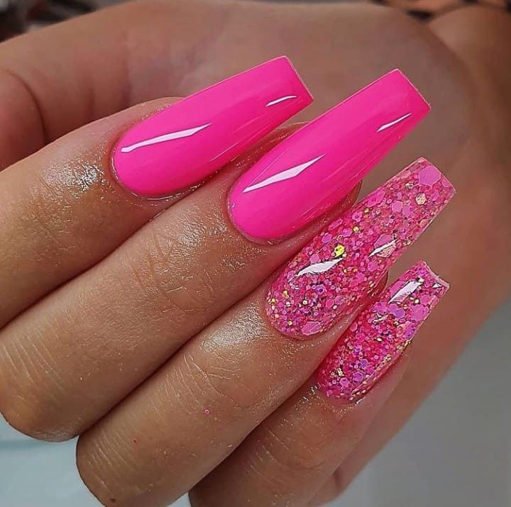 Elegant Vibrant Pink Nail Design with Glossy Finish and Glitter Accents