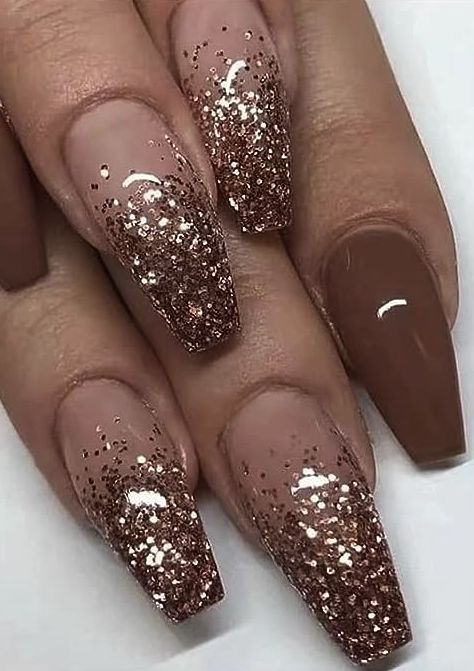 Chic Glitter Ombre Nails: Soft Nude Meets Shimmering Bronze.