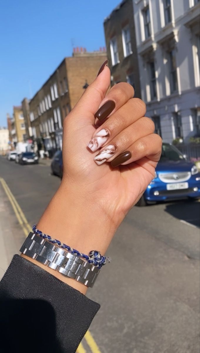 Sophisticated Nail Design: Rich Brown and Artistic Marble Patterns for Every Occasion