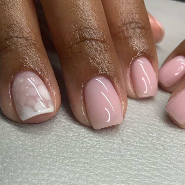 Elegant Soft Pink Nail Design with Marble Accent