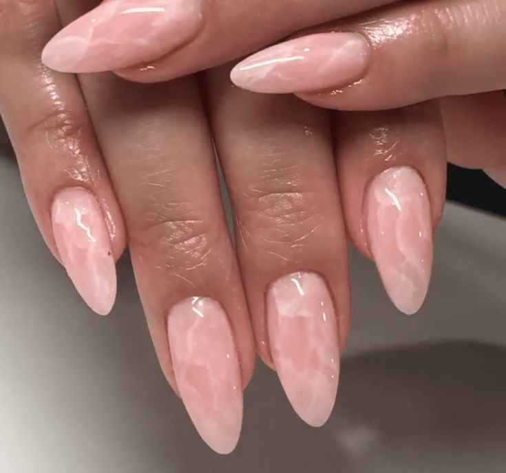 Elegant Ombre Almond-Shaped Nails: A Soft Pink Blend with a Glossy Finish.