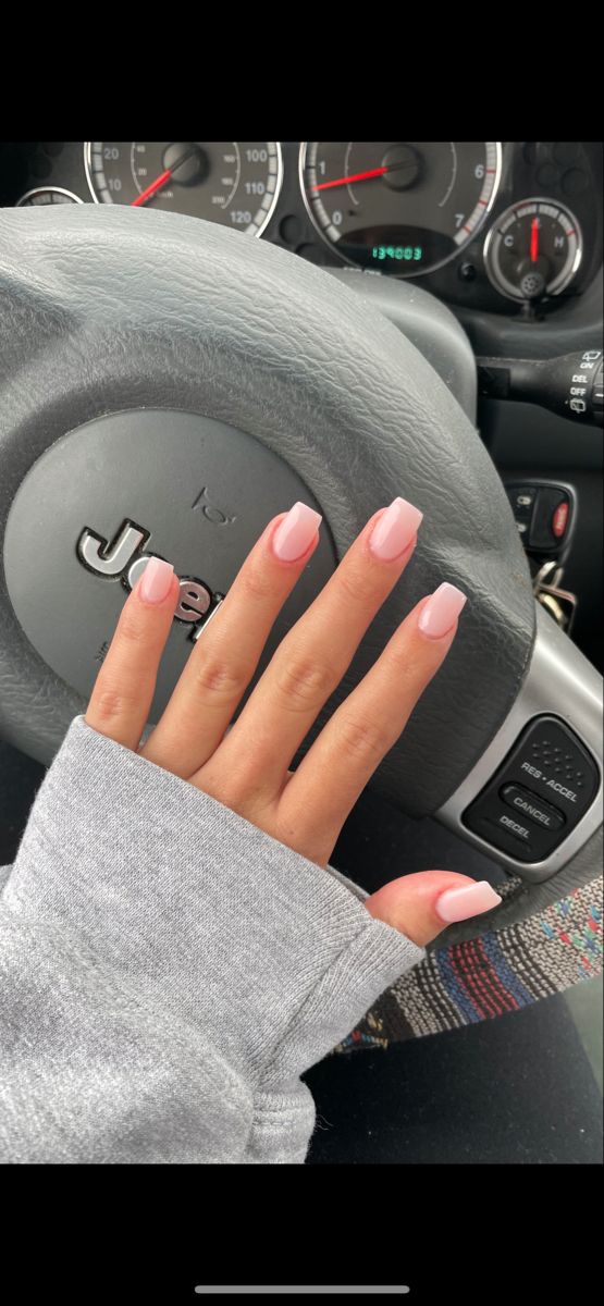 Elegant Soft Pink Manicure with Glossy Square Nails for Versatile Sophistication.