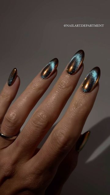 Captivating Chrome-Finished Nails with Holographic Bronze-Teal Elegance.