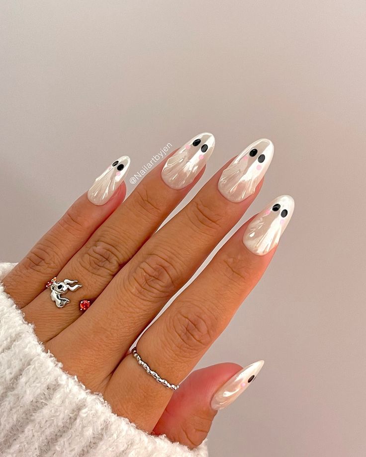 Whimsical Ghost-Themed Nail Design: A Playful Halloween Manicure.