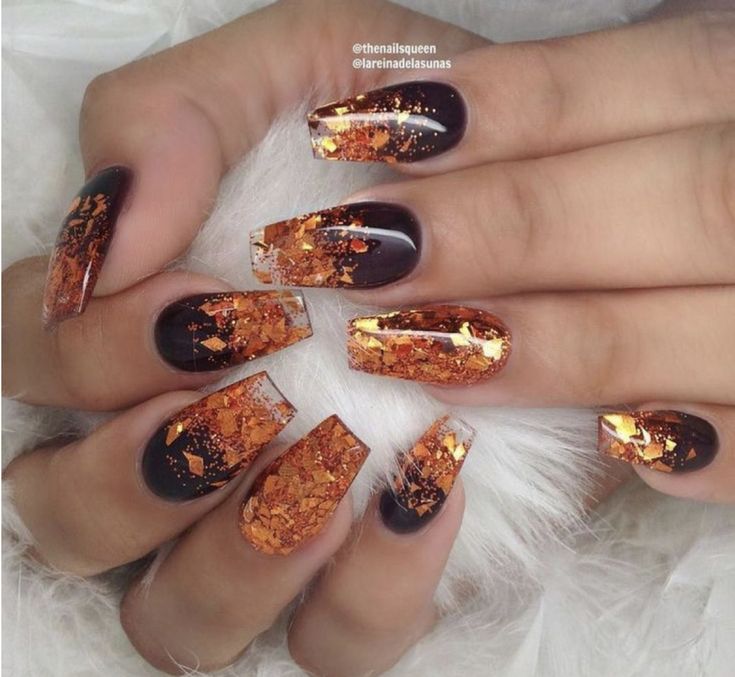 Luxurious Nail Design with Deep Brown-Orange Gradient and Gold Leaf Accents.