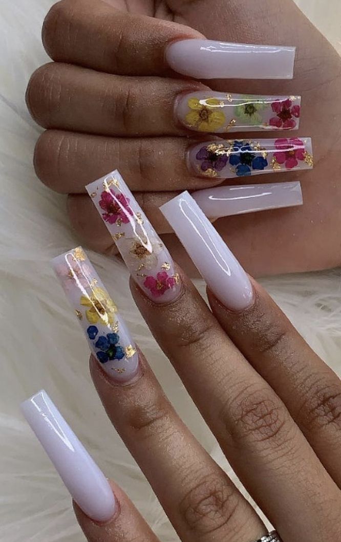 Elegant Floral Acrylic Nails with Pastel Hues and Gold Flakes