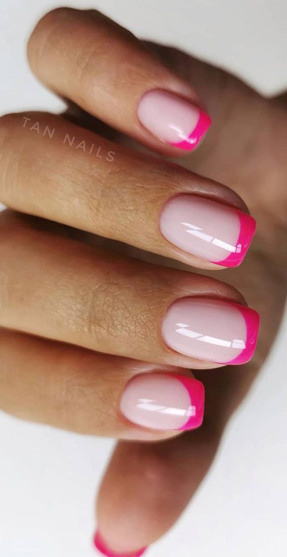 Vibrant Twist on Classic French Manicure: Soft Pink Base with Bold Hot Pink Tips.