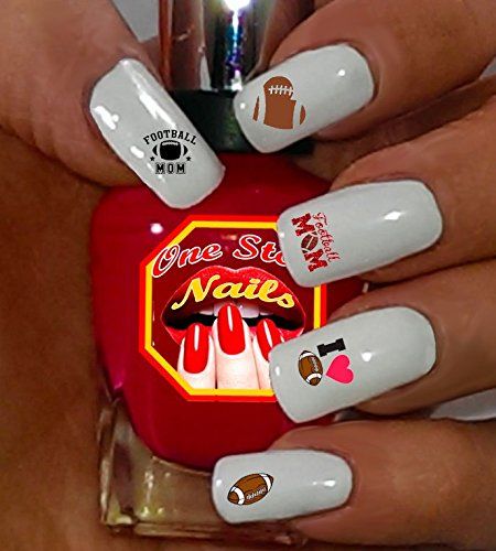 Sporty Glossy White Nail Art with Playful Football Motifs for Enthusiasts.