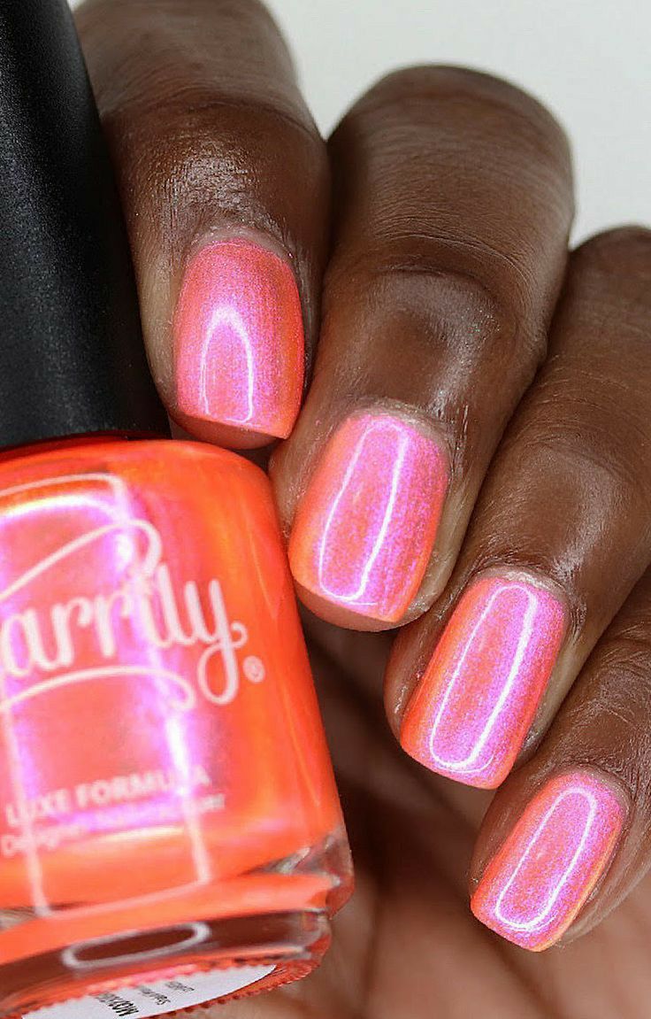 Shimmering Coral-Orange Nail Design: A Radiant Summer Elegance for All Skin Tones.