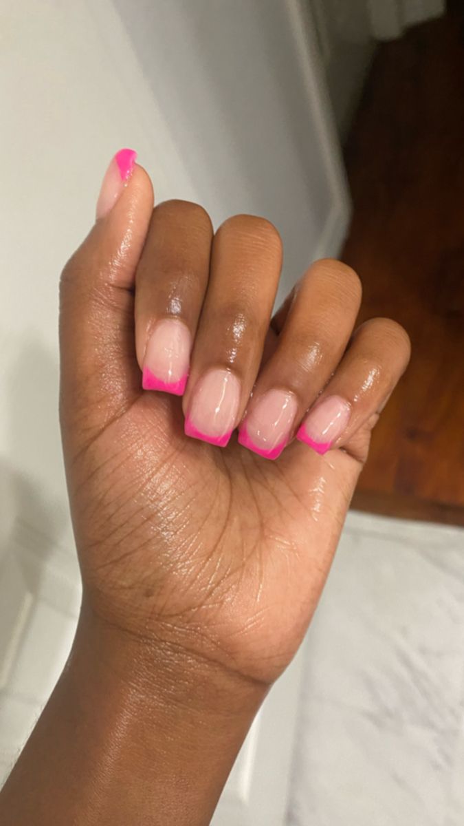 Chic Acrylic Nails with Bold Hot Pink French Tips for a Playful Twist.