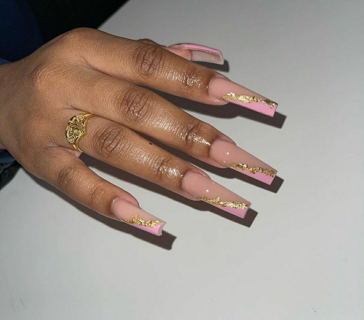 Chic Long Nails with Soft Pink Base and Elegant Gold Accents