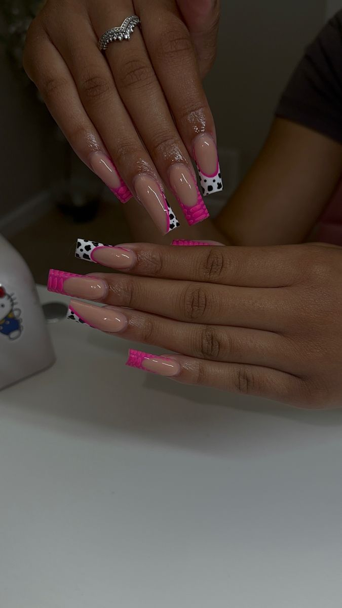 Chic Pink and Black Polka Dot Nail Design with Nude Base