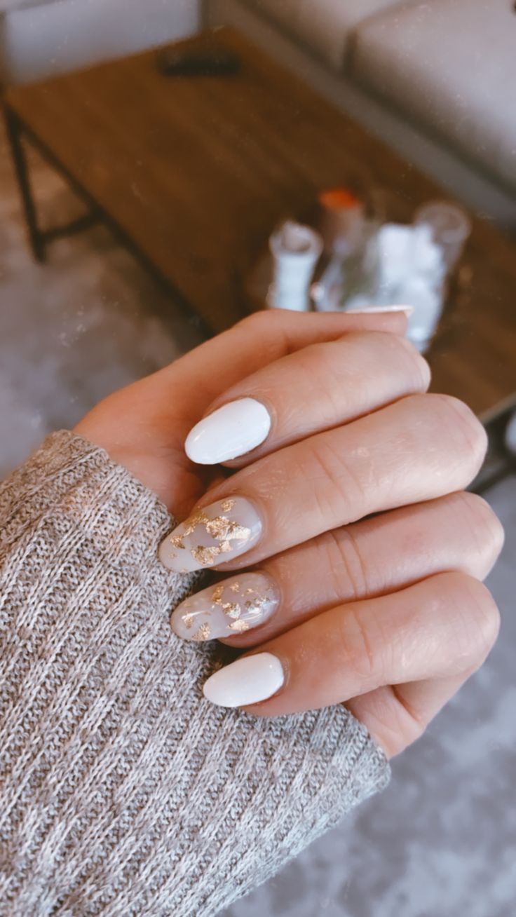 Chic Minimalist Nail Design with Gray, White, and Gold Accents.