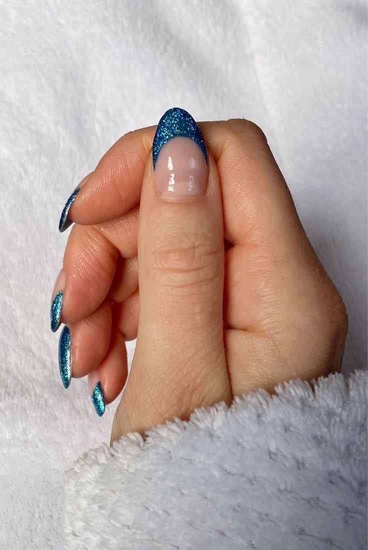 Elegant Glossy Blue Glitter French Manicure Design