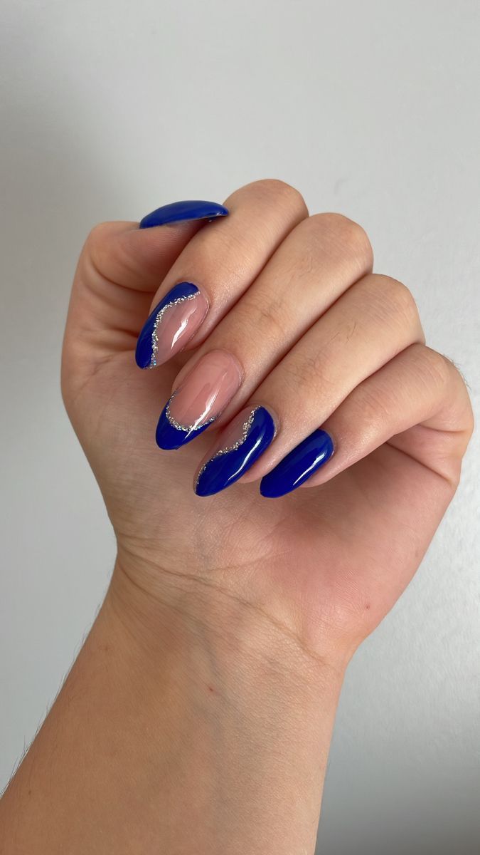 Elegant Dual-Tone Nail Design: Bold Blue and Nude with Silver Accents