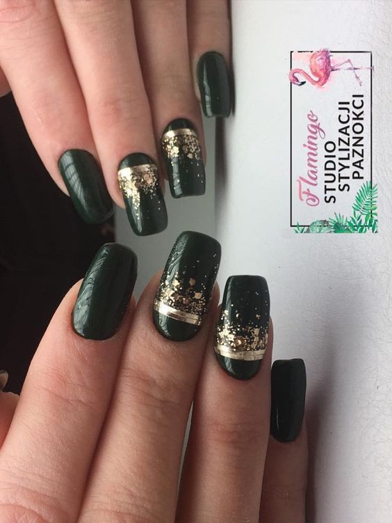 Glamorous Dark Green and Gold Nail Design for Special Occasions.