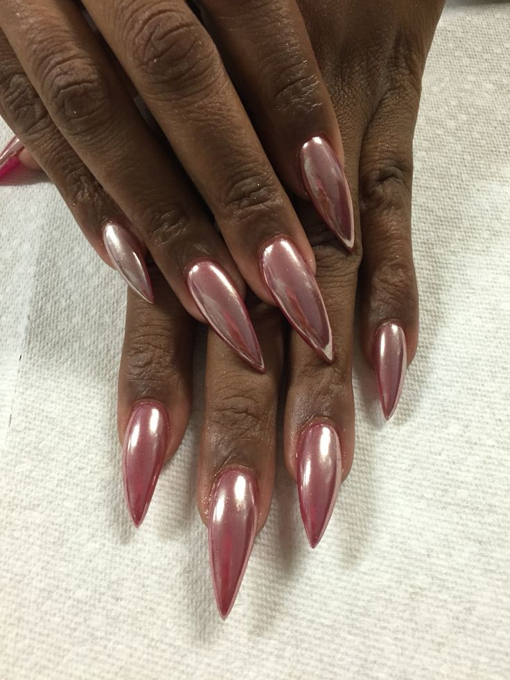 Elegant Rose Gold Metallic Elongated Nails: A Modern Statement of Sophistication.