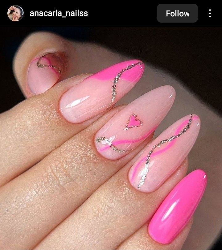 Chic Nail Art: Soft and Bold Pink Design with Glitter Accents and Heart Detail