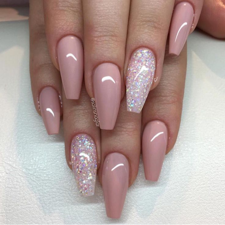 Sophisticated Elegant Nude Nail Design with Glossy Soft Pink and Iridescent Glitter Accents