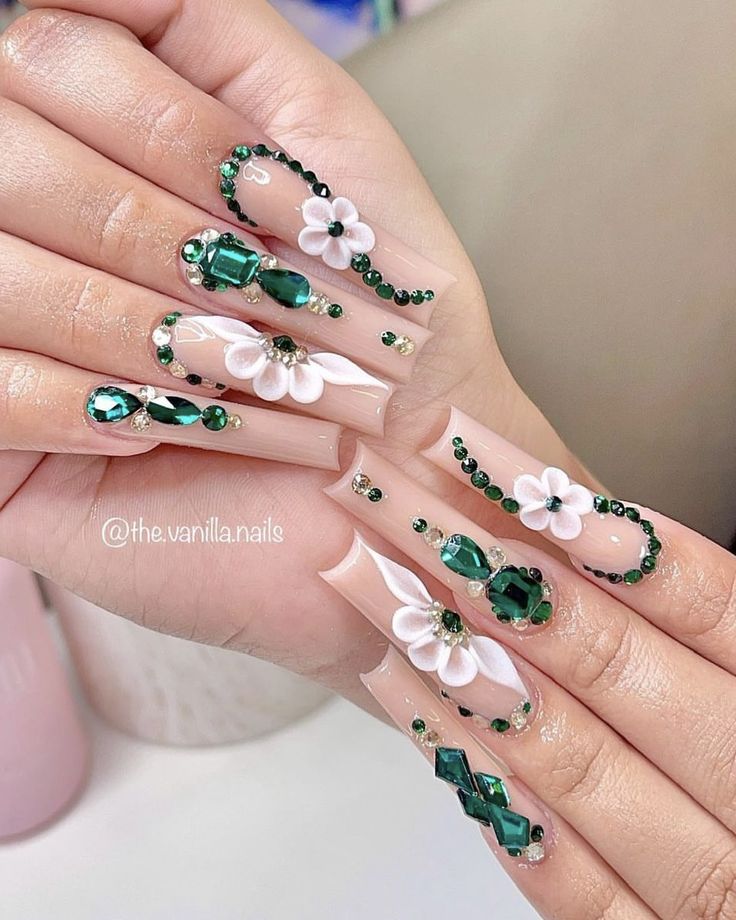 Sophisticated Nail Art: Pastel Colors, Vibrant Green Accents, Floral Embellishments, and Sparkling Gems.