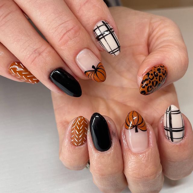 Trendy Autumn Nail Design: Warm Tones, Playful Patterns, and Textured Elements