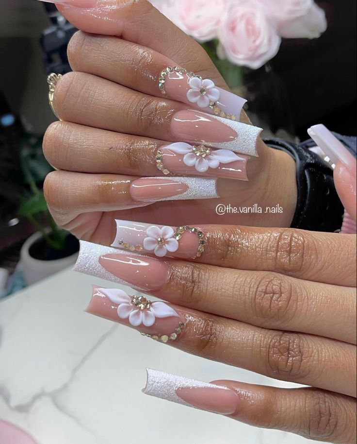 Elegant Almond-Shaped Nail Design with Floral Motif and Pearlescent Accents