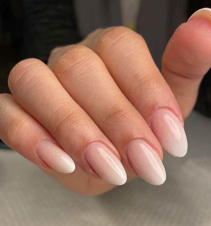 Chic Almond-Shaped Nails with Delicate Ombre Transition and Glossy Finish