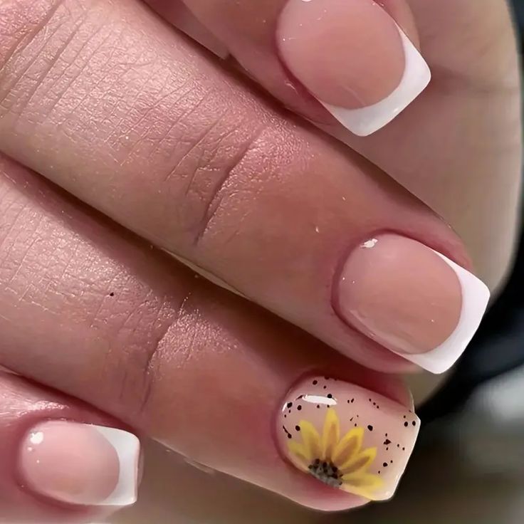 Elegant Floral French Tip Nail Design: A Chic Balance of Sophistication and Creativity.